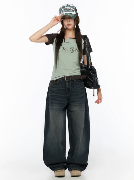 Jan Back Pocket Washed Wide Jeans IL515 Dark blue full-body front view on model wearing cap and carrying black bag, showing complete street style outfit