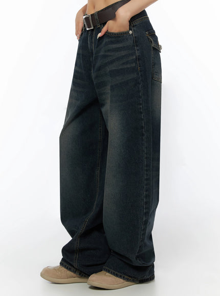 Jan Back Pocket Washed Wide Jeans IL515 Dark blue side view on model showing wide-leg balloon silhouette and side seam stitching with brown belt
