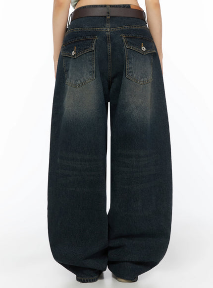 Jan Back Pocket Washed Wide Jeans IL515 Dark blue back view on model showing flap back pockets with button closures and faded wash detail