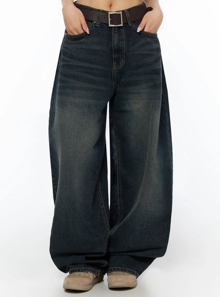 Jan Back Pocket Washed Wide Jeans IL515 Dark blue front cropped view on model with hands in pockets showing wide-leg silhouette and washed denim texture