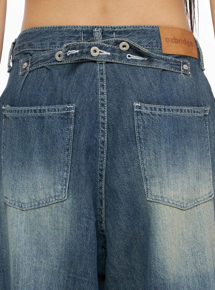 Jesse Vintage Wash Wide Leg Jeans CU530 Blue close-up back detail showing waistband buttons, ozbridge leather patch label and back patch pockets