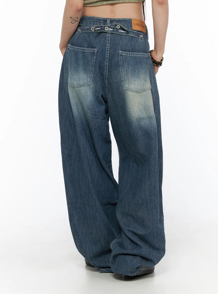 Jesse Vintage Wash Wide Leg Jeans CU530 Blue back view on model, showing ozbridge label, back patch pockets, wide leg hem pooling at floor
