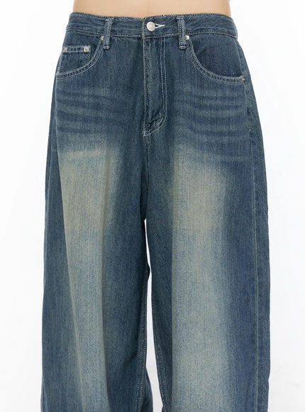 Jesse Vintage Wash Wide Leg Jeans CU530 Blue close-up front detail on model, showing waistband, front pockets and vintage wash fading texture