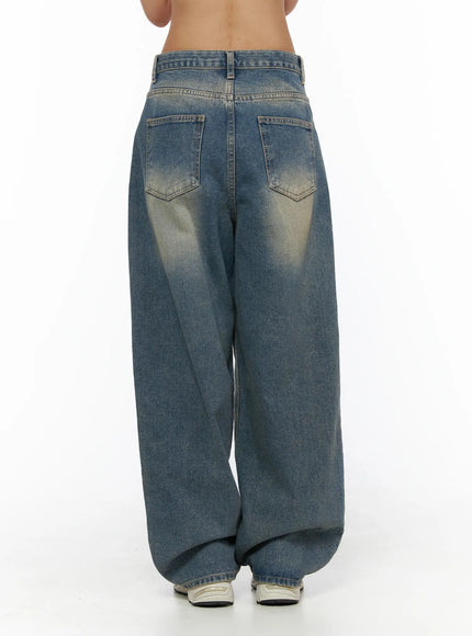 Jiya Washed Wide Leg Jeans CL503 Blue back view cropped at waist on model showing dual back pockets and sand-fade wash on wide balloon leg
