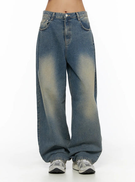 Jiya Washed Wide Leg Jeans CL503 Blue front view on model cropped at waist with stronger visible fading highlight across thighs and wide silhouette