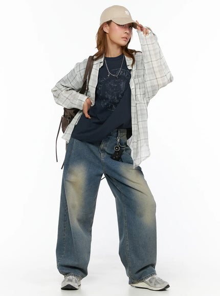 Jiya Washed Wide Leg Jeans CL503 Blue full-body styling shot on model wearing plaid shirt cap and crossbody bag in casual streetwear look