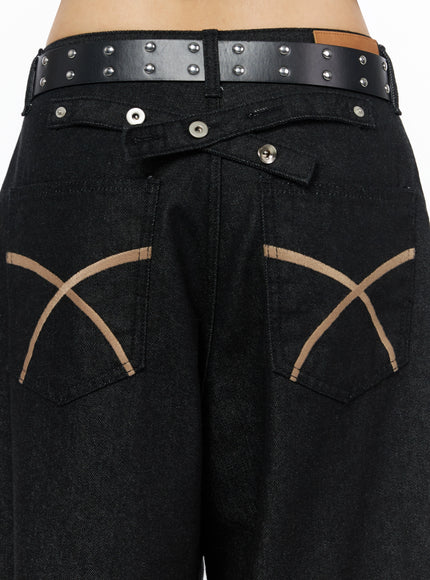 Kairo Back Buckle Wide Jeans IL515 Black close-up detail of back waistband showing cross-knot tie, snap buttons, and tan X-stitch pocket embroidery