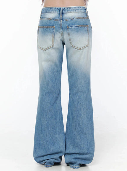 Keilani Low-Rise Bootcut Jeans IL502 Blue back crop shot on model showing dual back pockets with contrast topstitching, faded wash waistband detail