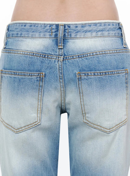 Keilani Low-Rise Bootcut Jeans IL502 Blue close-up back detail of waistband, dual back pockets, golden contrast stitching, vintage faded denim texture