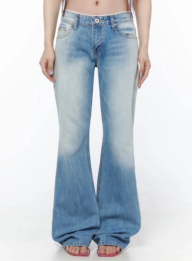 LEWKIN Keilani Low-Rise Bootcut Jeans IL502 Blue front crop shot on model showing low-rise waistband, button fly, faded wash flare leg, size S