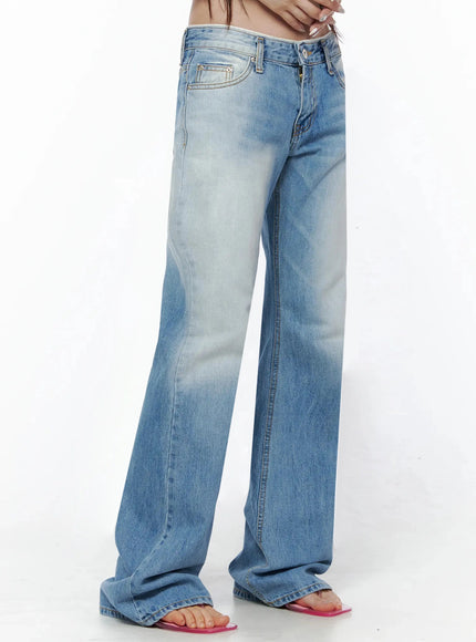 Keilani Low-Rise Bootcut Jeans IL502 Blue side shot on model showing low-rise fit, front pocket detail, faded wash, full-length flared leg