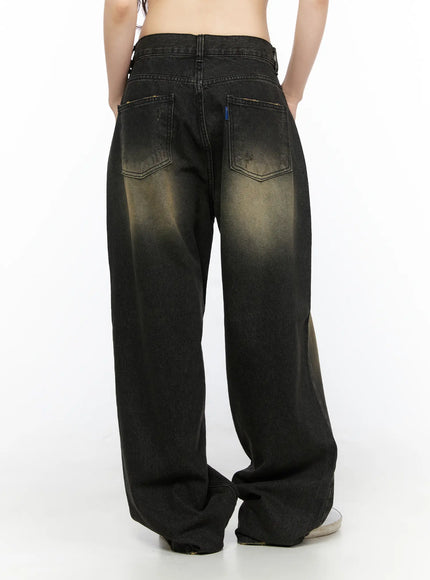 Keisha Washed Baggy Jeans CL523 Black back view on model, cropped waist shot showing back pockets, blue tab, distressed stitching and acid wash fade