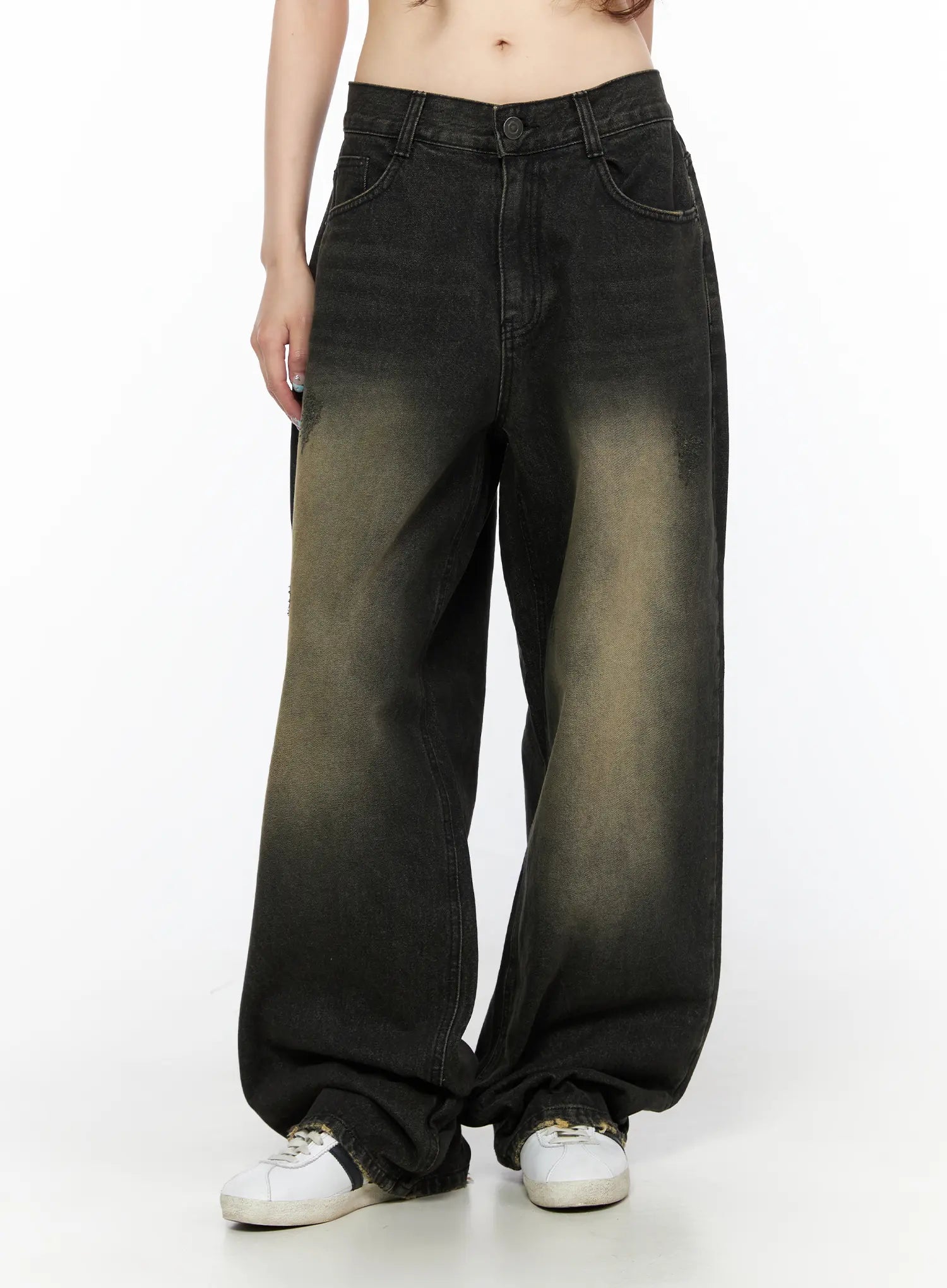 Keisha Washed Baggy Jeans CL523 Black front view on model, cropped waist shot highlighting prominent yellow-khaki center fade and wide-leg pooled hem