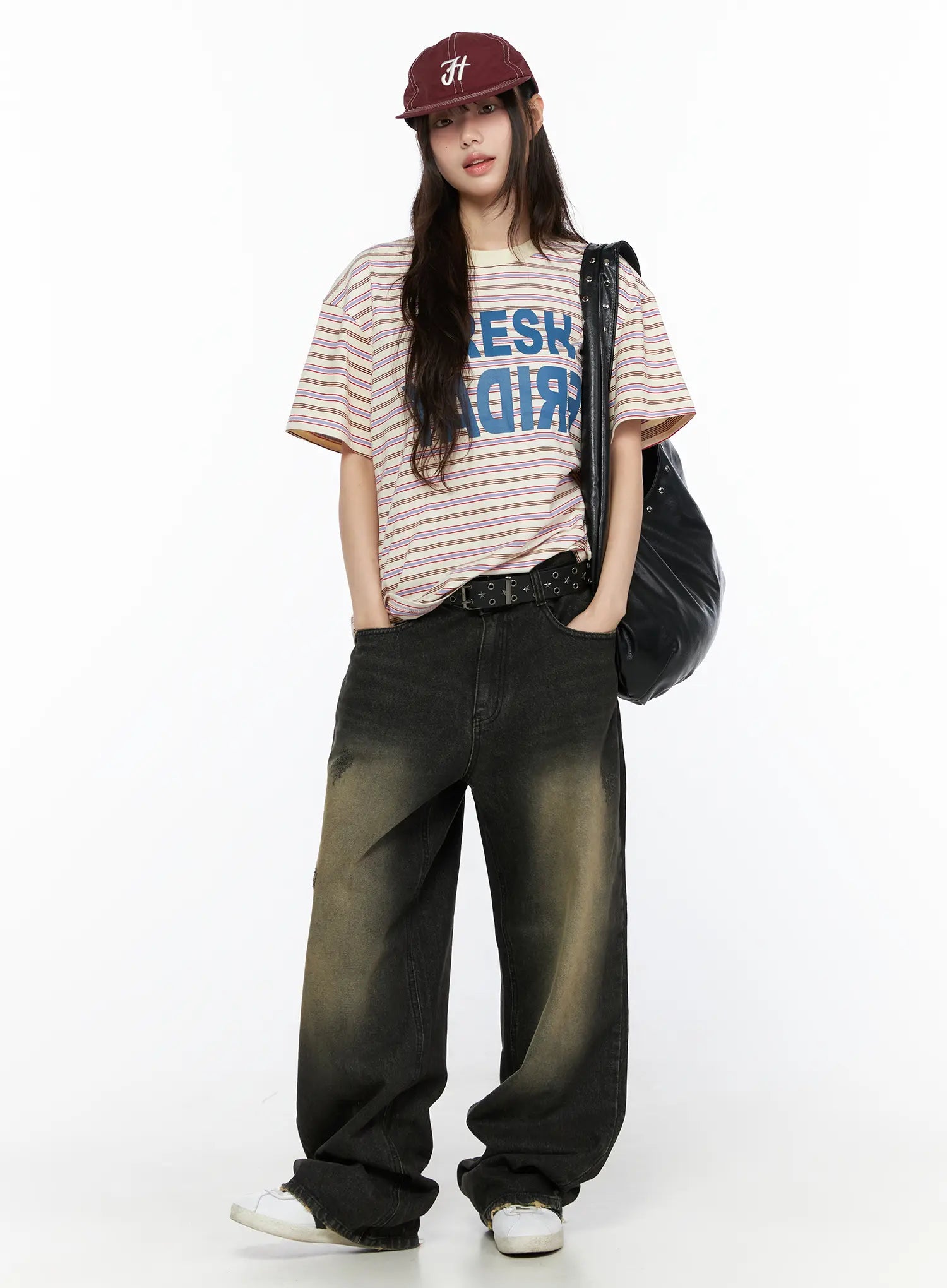Keisha Washed Baggy Jeans CL523 Black full-body front on model styled with striped graphic tee, baseball cap, leather bag, and white sneakers