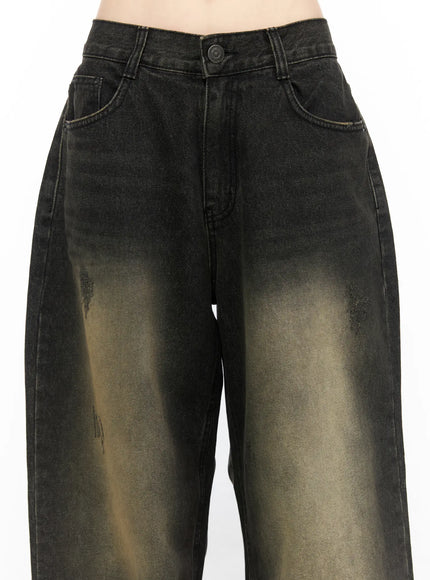 Keisha Washed Baggy Jeans CL523 Black close-up detail of waistband and front thigh area showing button, side pockets and yellow-khaki acid wash gradient