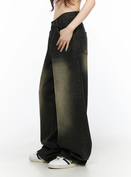 Keisha Washed Baggy Jeans CL523 Black side view on model, cropped waist shot showing wide-leg drape and yellow-khaki gradient wash detail