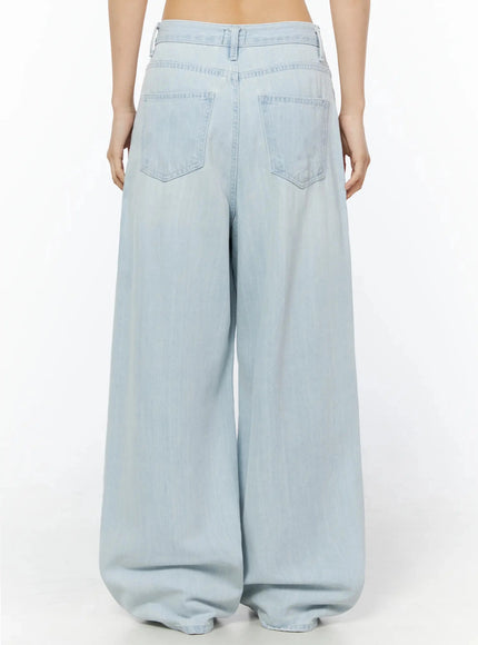 Keliana Soft Wide-Leg Jeans IL516 Light blue back full-length on model showing two back patch pockets, belt loops, and wide flared hem