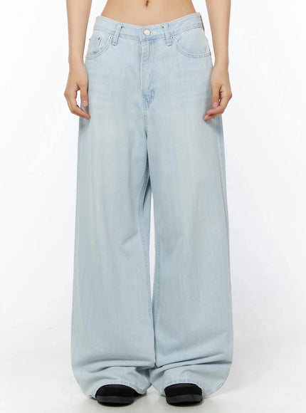 Keliana Soft Wide-Leg Jeans IL516 Light blue front view on model, hands relaxed at sides, ultra-wide leg denim pooling at floor