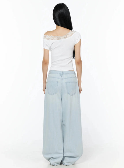 Keliana Soft Wide-Leg Jeans IL516 Light blue back full-length on model in white lace crop top showing rear pockets and wide hem