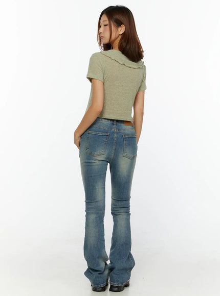 Kendall Vintage Bootcut Jeans CL515 Blue back full-body shot on model showing faded wash back pockets ozbridge leather patch and flared leg
