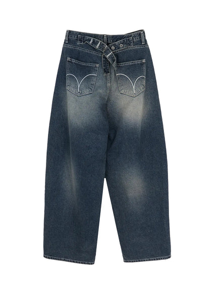 Kenji Baggy Wide-Leg Jeans IL524 Dark blue flat-lay back view on white background showing crossover waistband, arc-embroidered back pockets, and faded wash denim