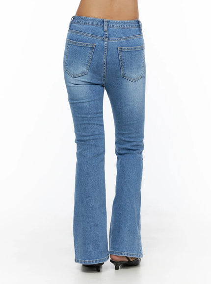 Kerry Washed Bootcut Jeans CL503 Blue back view on model standing showing dual patch pockets faded wash detail and wide bootcut flare
