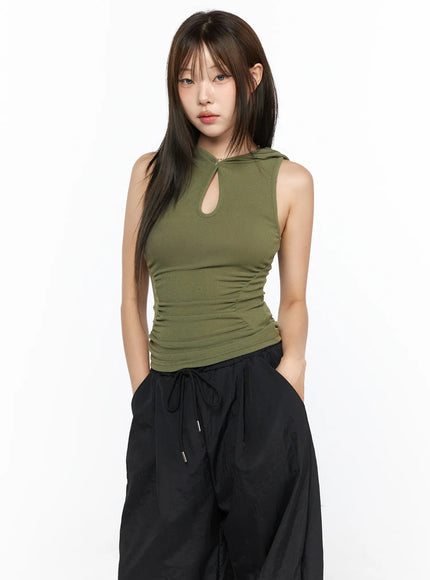 Keyhole Button Hooded Crop Sleeveless Top CL514 Dark green front model shot hood down keyhole neckline ruched ribbed fabric styled with black drawstring parachute pants