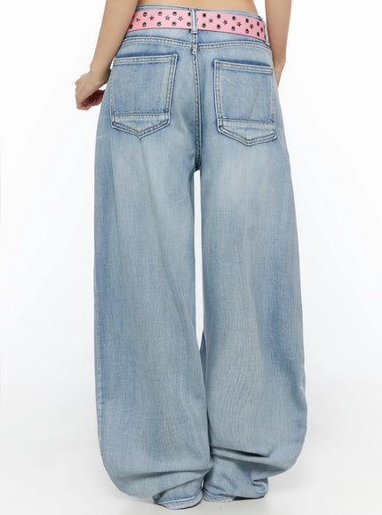 Kit Washed Wide Leg Jeans IL523 Light blue back view on model, close-up of dual back patch pockets and pink star-stud belt with grommet detail