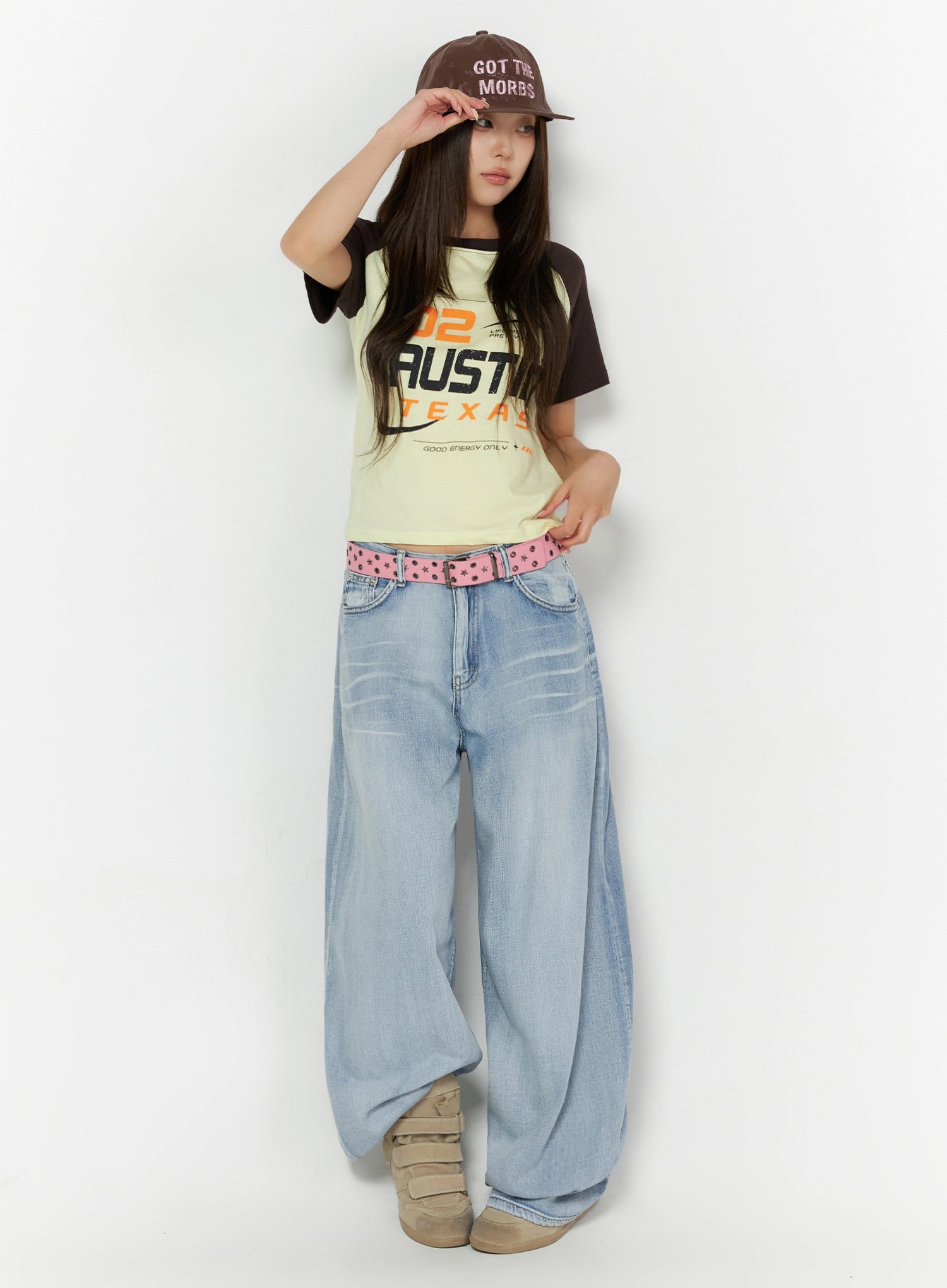 Kit Washed Wide Leg Jeans IL523 Light blue full-length front view on model wearing cap and graphic tee, oversized wide leg silhouette with pink studded belt