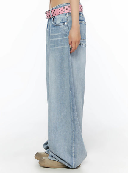 Kit Washed Wide Leg Jeans IL523 Light blue side full-length solo view on model, pink star-eyelet belt visible, extreme wide leg pooling at ankles