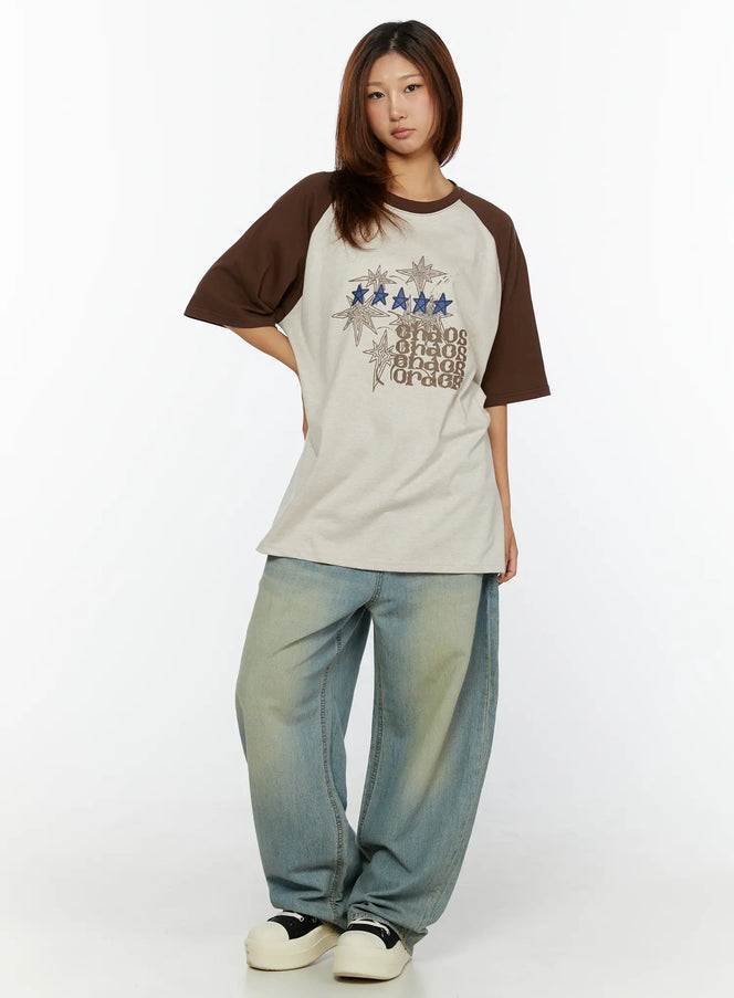 Kiva Washed Wide-Leg Jeans CL515 Light blue full-body front styling shot on model in oversized graphic raglan tee, standing straight, showing full trouser silhouette