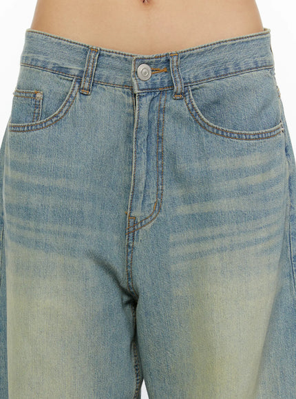 Kiva Washed Wide-Leg Jeans CL515 Light blue close-up detail of front waistband showing silver button, coin pocket, and contrast amber topstitching on faded denim