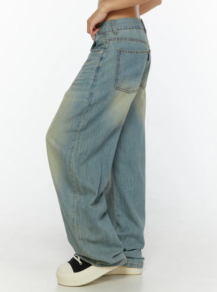 Kiva Washed Wide-Leg Jeans CL515 Light blue side view on model highlighting dropped crotch, exaggerated wide-leg balloon shape, and faded denim texture