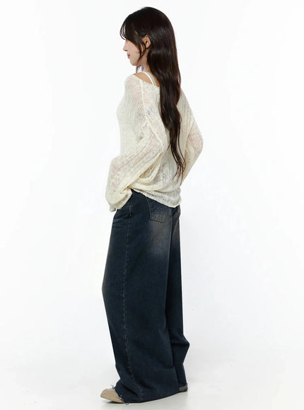 Knit Boat Neck Sweater IL506 Light beige side shot on model facing away slightly, sheer open-knit back detail, relaxed silhouette, paired with wide-leg jeans, S/M