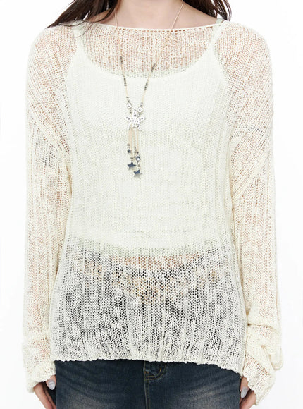 Knit Boat Neck Sweater IL506 Light beige close-up front detail shot on model, sheer open-knit texture, boat neckline, silver star charm necklace, layered cami, S/M