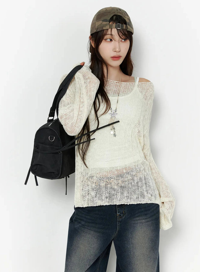 LEWKIN Knit Boat Neck Sweater IL506 Light beige front shot on model wearing camo cap and black backpack, sheer open-knit texture, layered over white cami, S/M