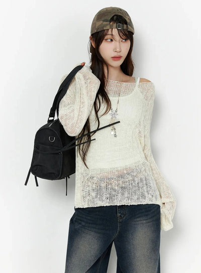 LEWKIN Knit Boat Neck Sweater IL506 Light beige front shot on model wearing camo cap and black backpack, sheer open-knit texture, layered over white cami, S/M
