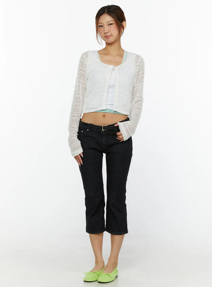 Knit Crop Cardigan CL515 White full-body front shot on model smiling styled with cropped black jeans and green flats