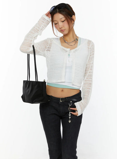LEWKIN Knit Crop Cardigan CL515 White half-body front shot on model wearing black jeans and carrying black tote bag
