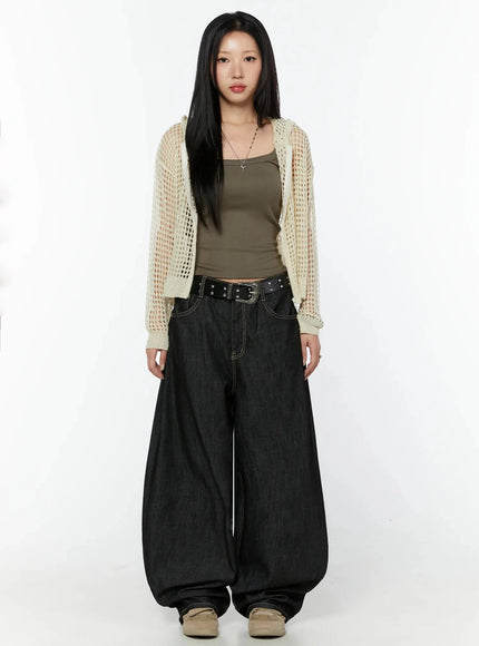 Knit Net Zip-Up Hoodie IL516 Light beige full-length front shot on model standing straight, sheer open-mesh knit hoodie over khaki tank and oversized dark wide-leg jeans