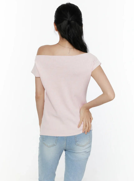 Knit Off-Shoulder Top CL521 Pink back shot on model showing clean back design, wide off-shoulder neckline and soft knit fabric, styled with blue jeans