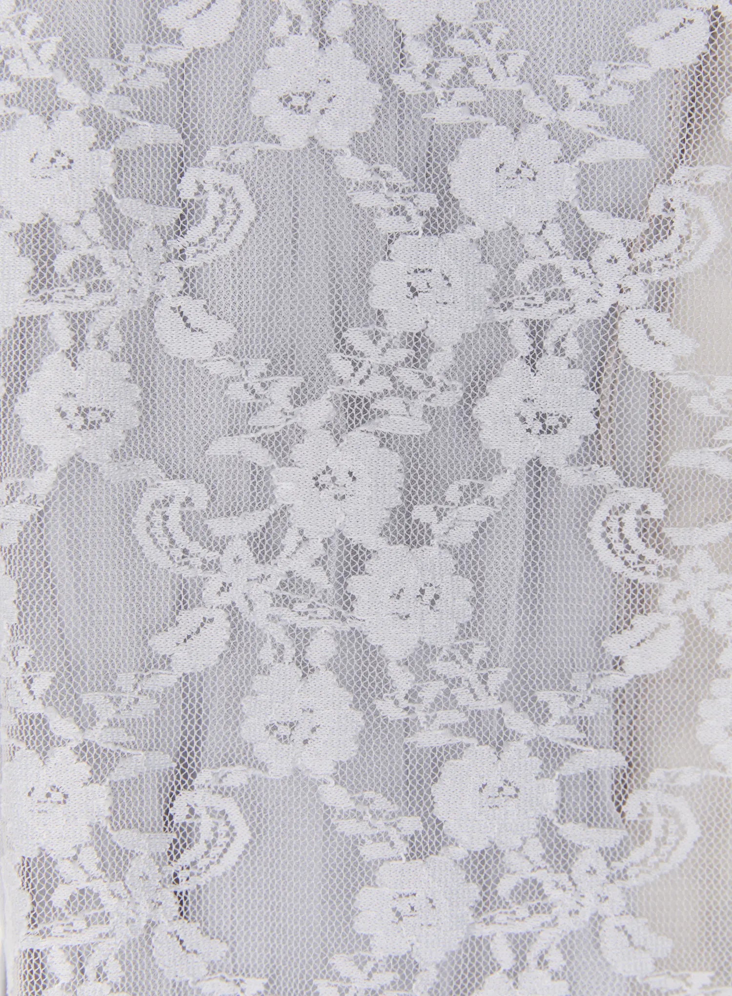 Lace Accent Sheer Scarf CL513 White close-up detail shot of floral lace pattern showing semi-sheer net fabric with raised rose and leaf motifs