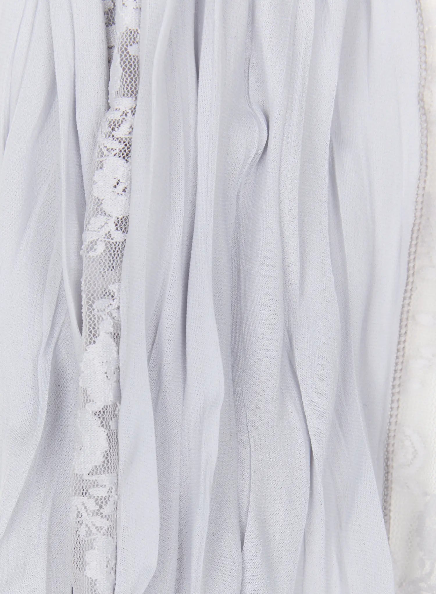 Lace Accent Sheer Scarf CL513 White close-up detail shot of soft sheer fabric drape alongside floral lace trim edge showing lightweight chiffon-like texture