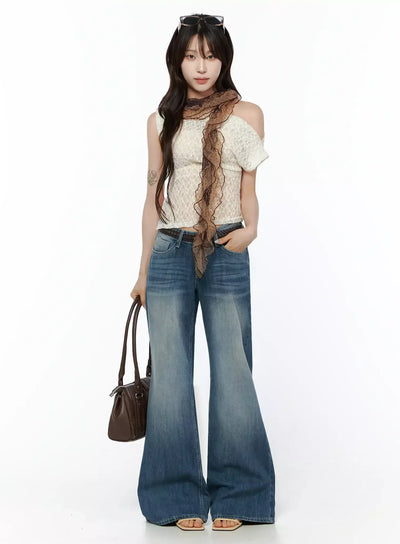 LEWKIN Lace Asymmetrical Off-Shoulder Top IL506 Light beige full-body front shot on model styled with wide-leg jeans brown scarf bag and sunglasses