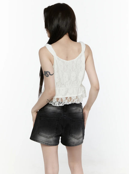 Lace Button-Up Cami Blouse IL522 White back model shot showing sheer floral lace back wide straps and layered lace ruffle hem with denim shorts