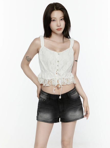 Lace Button-Up Cami Blouse IL522 White front model shot short hair relaxed arms-down pose showing pearl button placket and semi-sheer lace ruffle hem