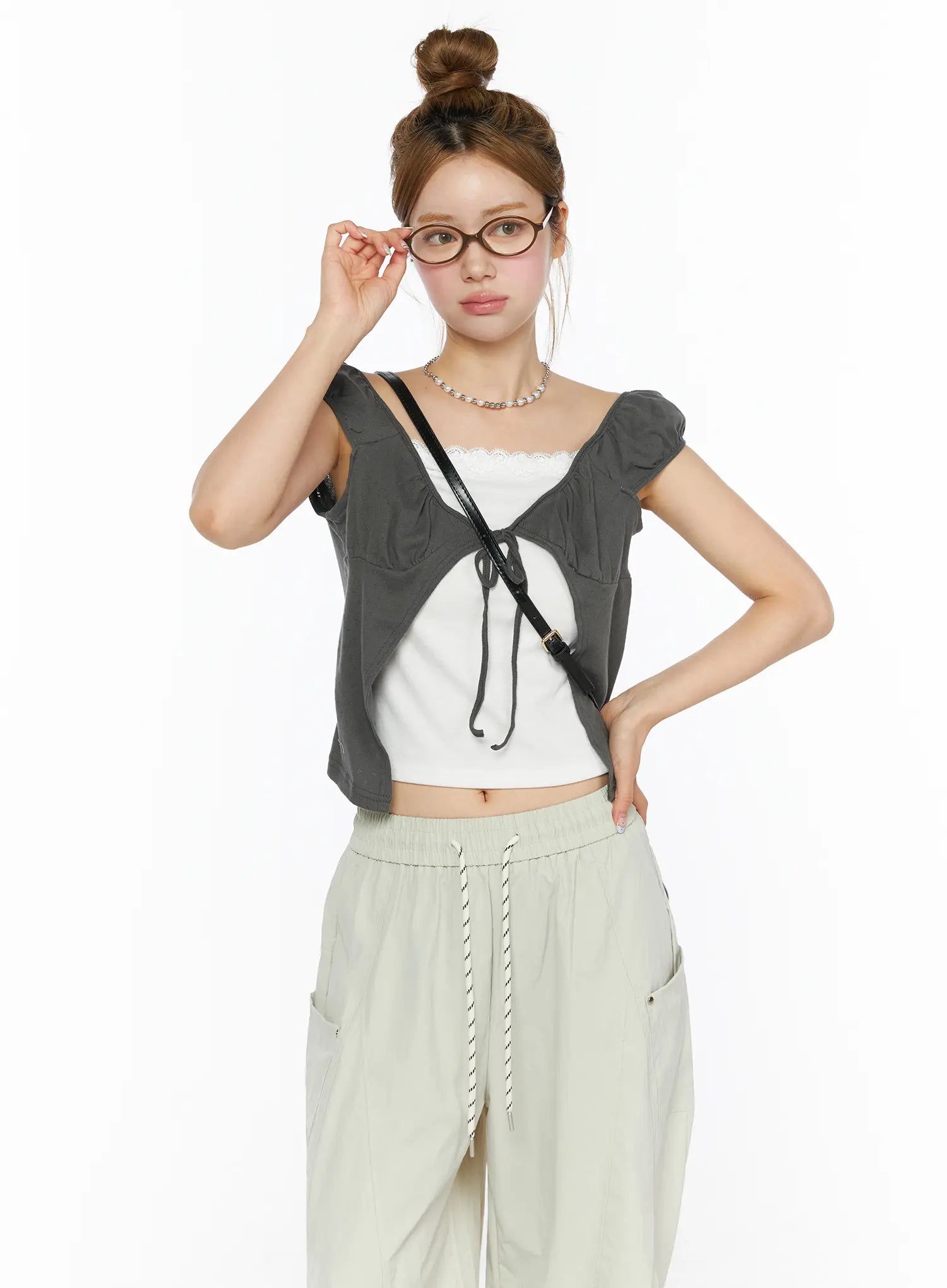 LEWKIN Lace Cami Tie-Front Puff Sleeve Blouse CL501 Dark gray front shot on model size S/M styled with glasses and crossbody bag over white lace cami
