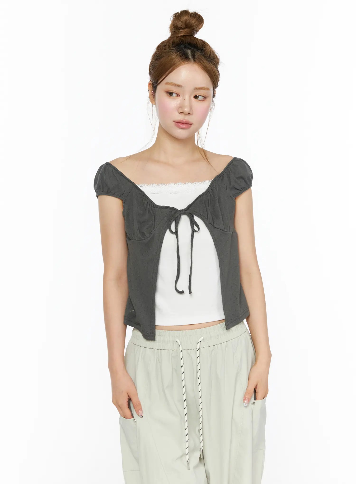 Lace Cami Tie-Front Puff Sleeve Blouse CL501 Dark gray upper-body front shot on model size S/M gazing aside showing tie-front detail layered over white lace cami