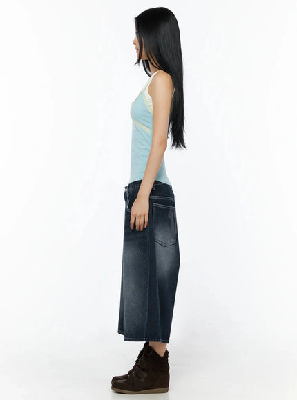 Lace Contrast Cami Top IL509 Light blue side shot on model showing slim ribbed profile white upper panel and cream lace trim with wide-leg denim