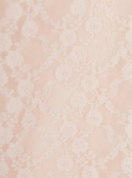 Lace Detail Capri Leggings CL508 close-up detail of peach-toned sheer floral lace fabric texture showing delicate flower and paisley embroidery on mesh ground
